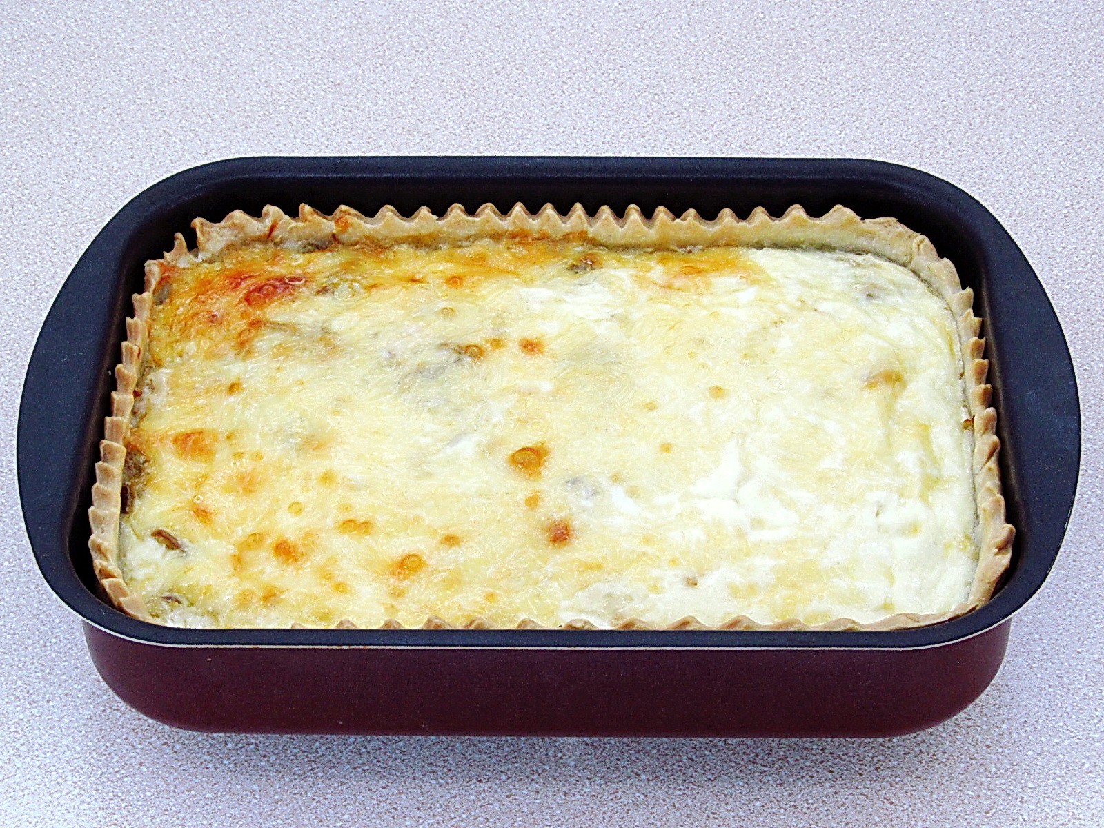 Шаг 25 приготовления Заливной пирог с курицей, грибами и капустой