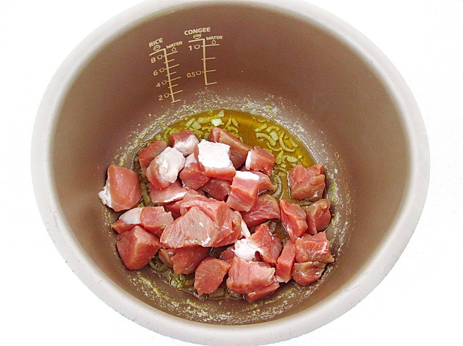 Шаг 4 приготовления Свинина с квашеной капустой и рисом в мультиварке