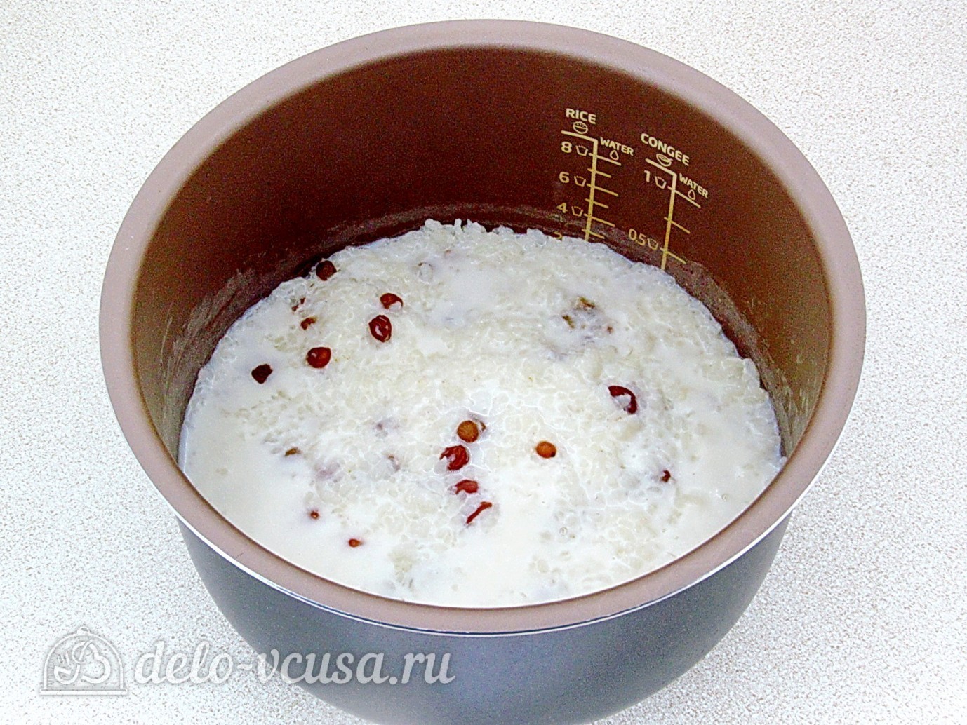 Шаг 3 приготовления Рисовая каша на молоке с изюмом