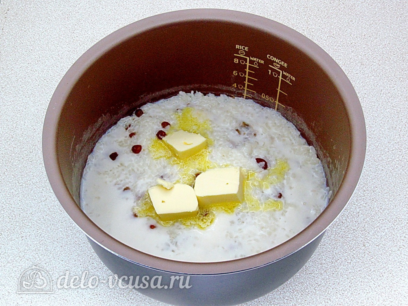 Шаг 4 приготовления Рисовая каша на молоке с изюмом