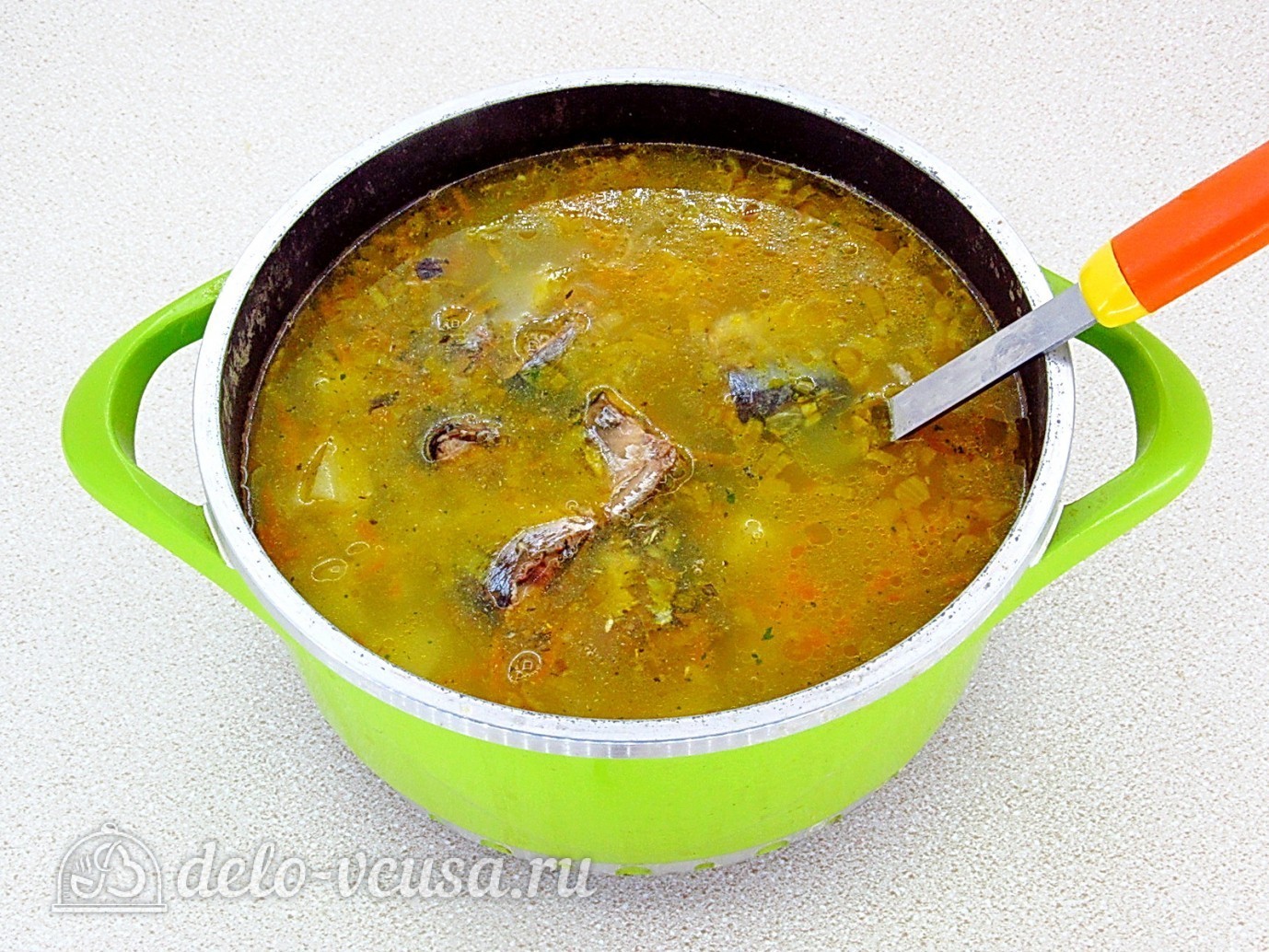Шаг 11 приготовления Суп из рыбной консервы с рисом
