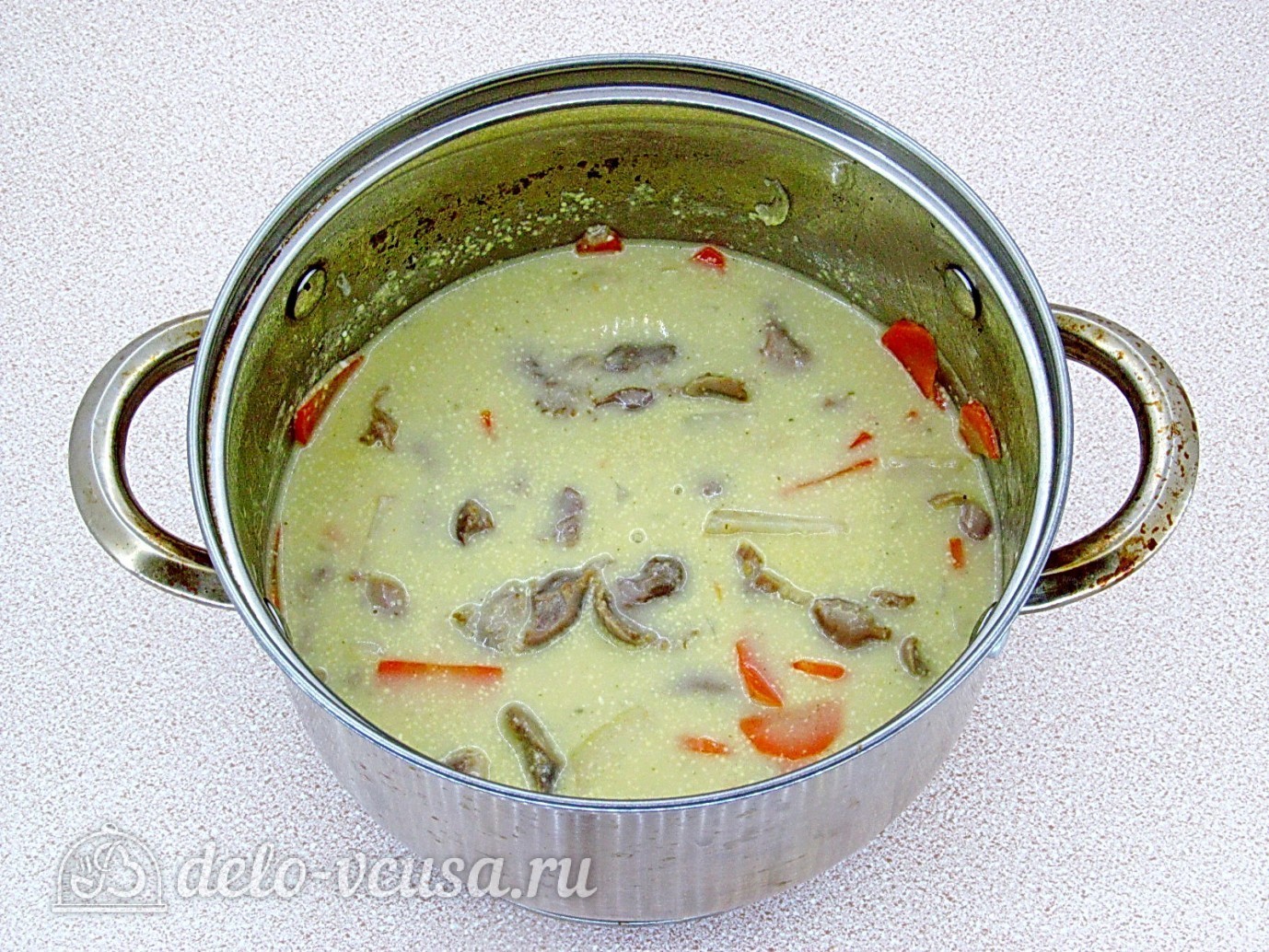 Шаг 11 приготовления Куриные желудки, тушенные в сметане