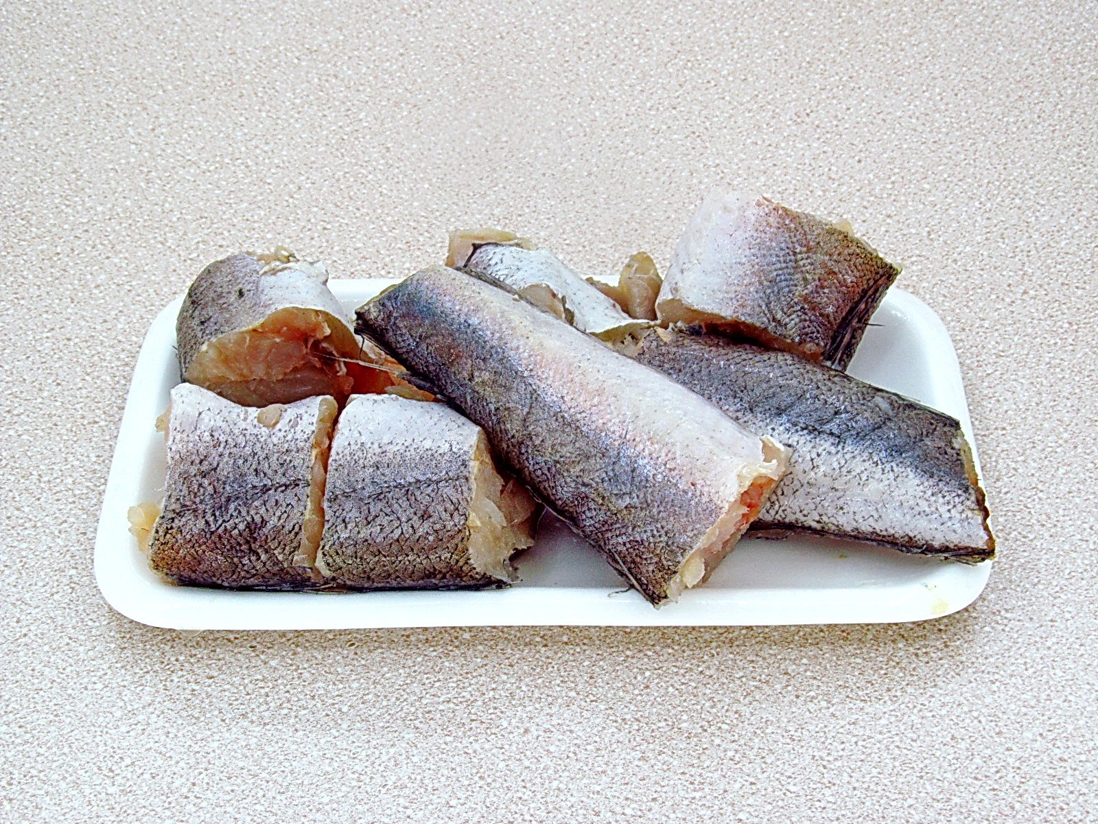 Шаг 6 приготовления Хек с овощами и сметаной