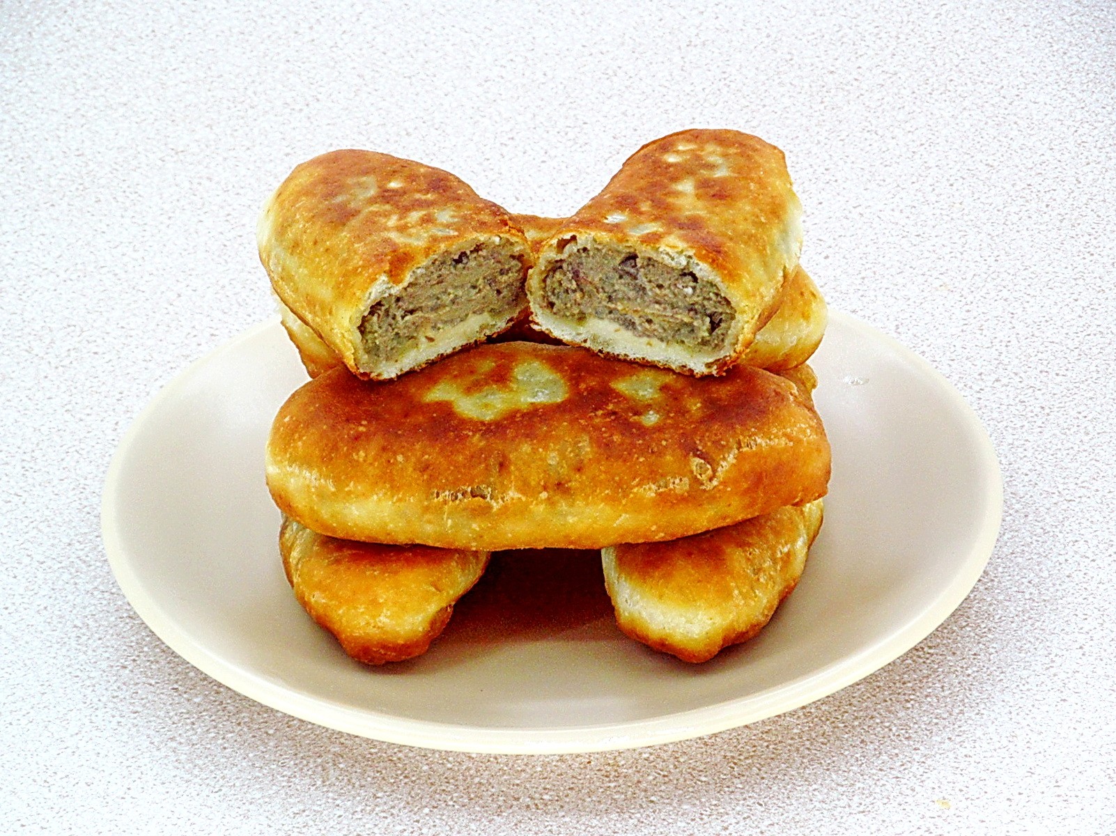 Шаг 20 приготовления Жареные пирожки на кефире с картофелем и куриной печёнкой