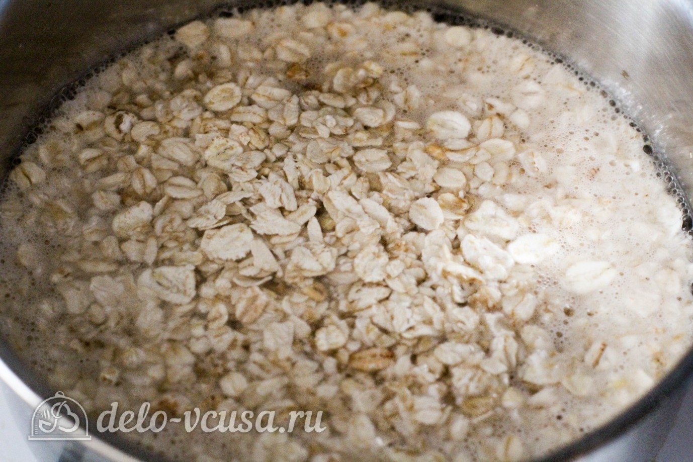 Шаг 1 приготовления Овсяная каша с изюмом