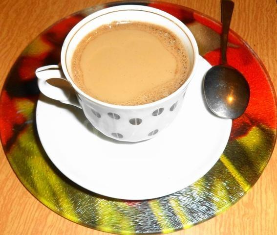 Шаг 6 приготовления Кофе с молоком, корицей и мускатным орехом