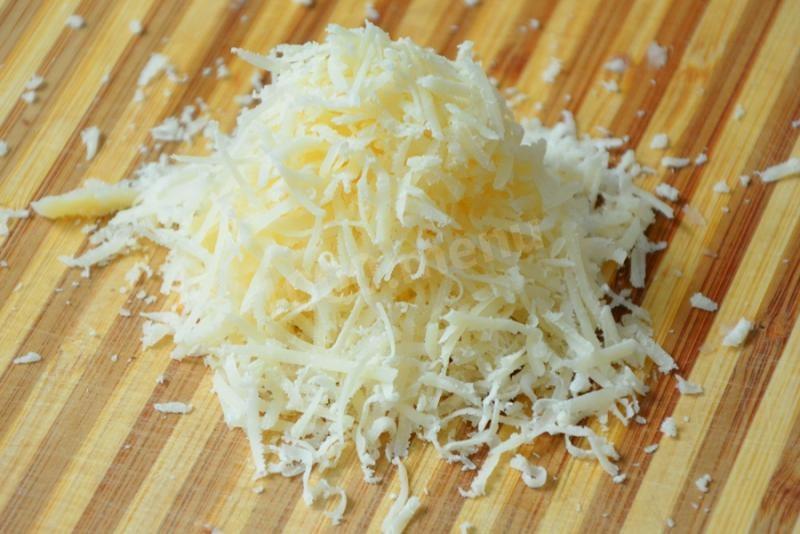 Шаг 6 приготовления Шампиньоны фаршированные курицей в духовке
