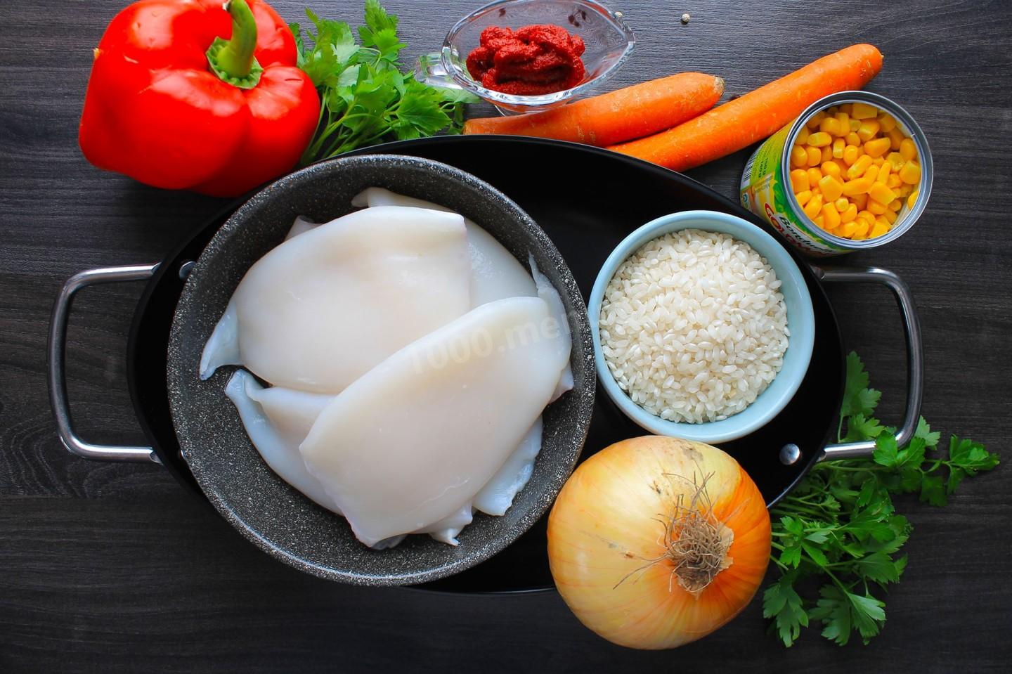 Шаг 1 приготовления Кальмары фаршированные рисом и овощами
