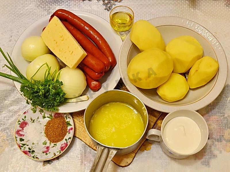 Шаг 1 приготовления Картофельная запеканка с сосисками и сыром в духовке