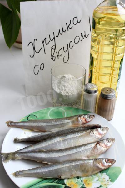 Шаг 1 приготовления Корюшка жареная на растительном масле в яйце и муке
