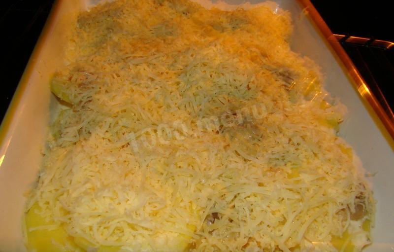 Шаг 11 приготовления Рыба в духовке с картофелем и грибами