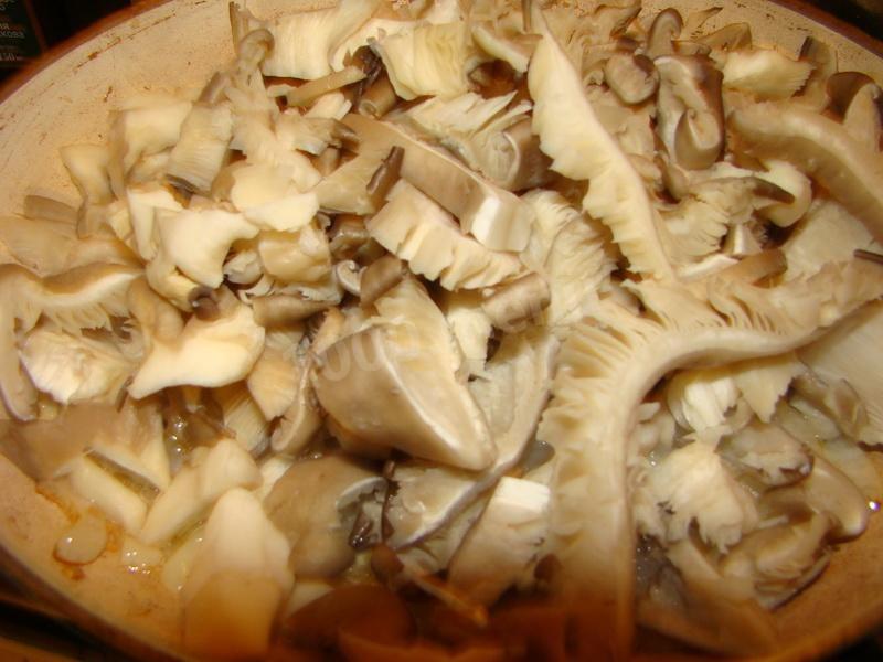 Шаг 9 приготовления Рыба в духовке с картофелем и грибами