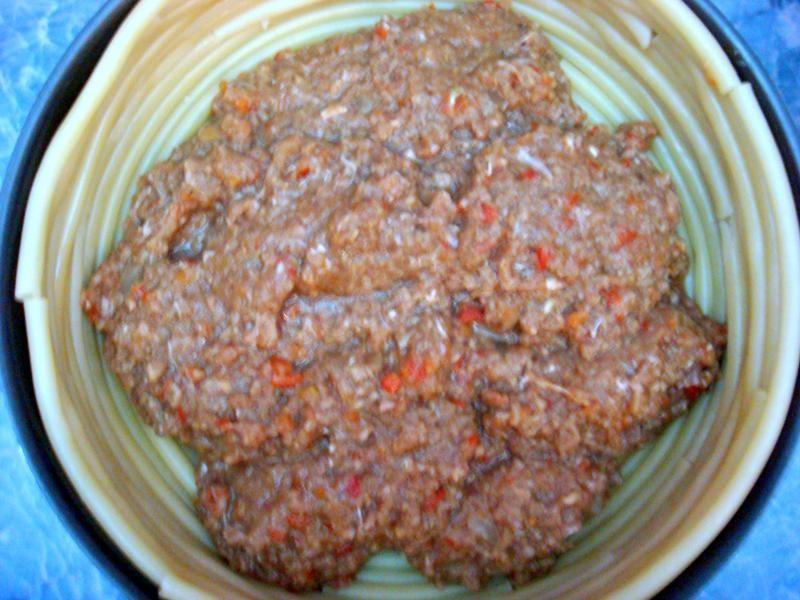 Шаг 14 приготовления Тимбаль мясной с шампиньонами