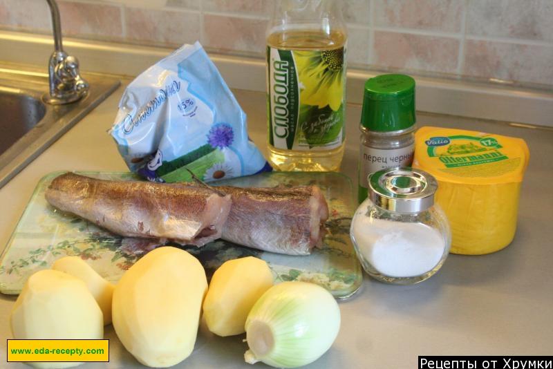 Шаг 1 приготовления Хек запеченный с картофелем и сыром