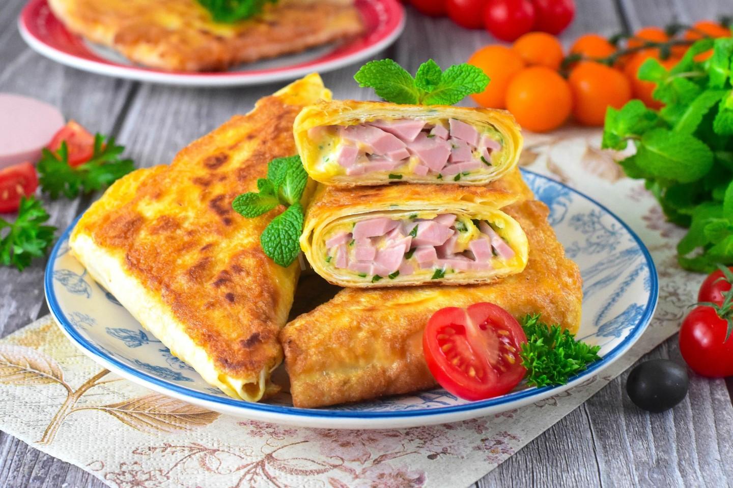 Обложка рецепта Конвертики из лаваша с колбасой и сыром