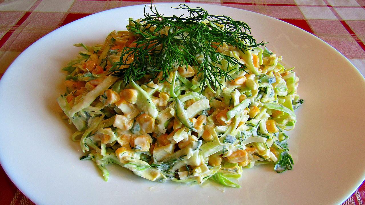 Обложка рецепта Салат из молодой капусты с кукурузой и огурцами