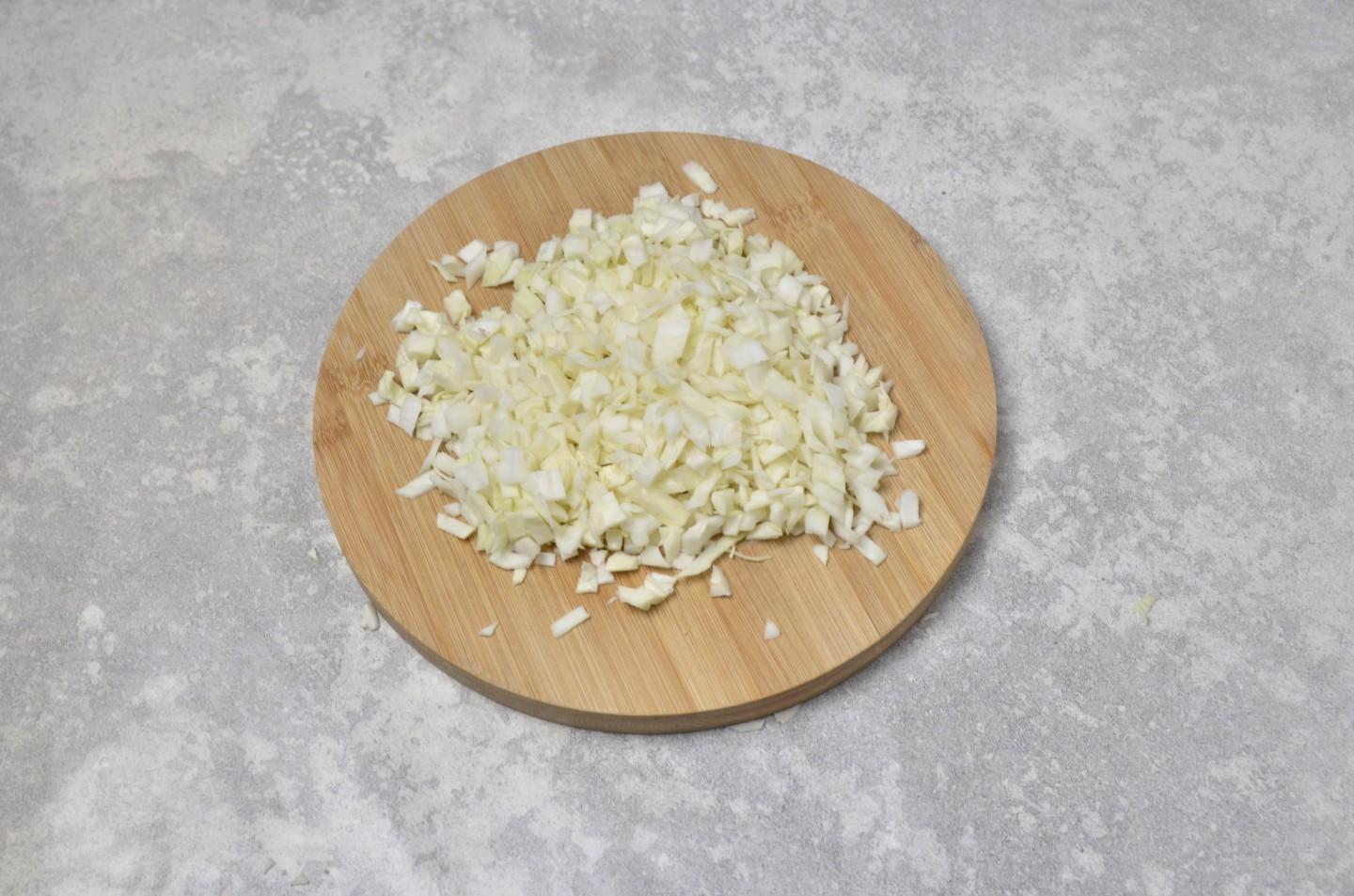 Шаг 3 приготовления Ленивые голубцы с рисом капустой и фаршем в кастрюле