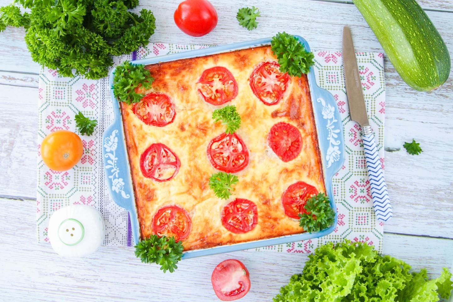 Обложка рецепта Кабачки с фаршем и картофелем в духовке
