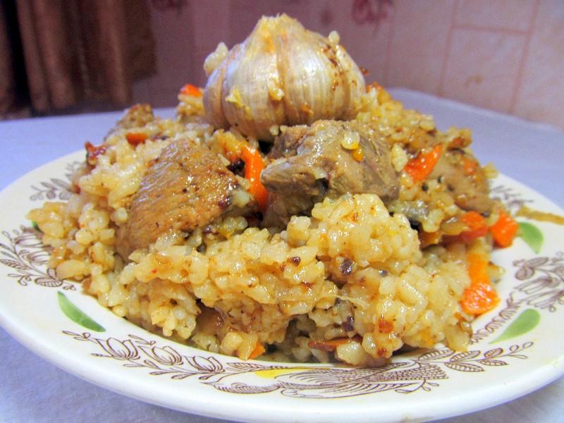 Шаг 16 приготовления Плов из утки в казане на плите
