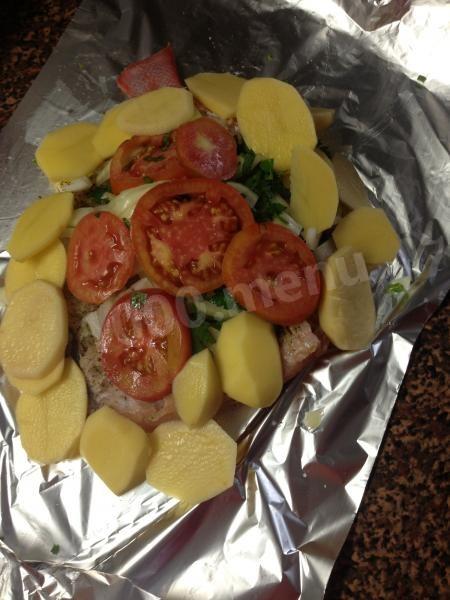 Шаг 9 приготовления Морской окунь с овощами в фольге