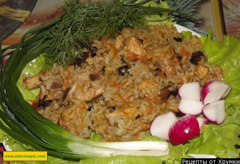 Обложка рецепта Рисовая каша с грибами и мясом на воде